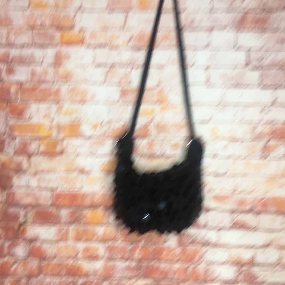 The Sak Black Sequined
Shoulder Evening Bag